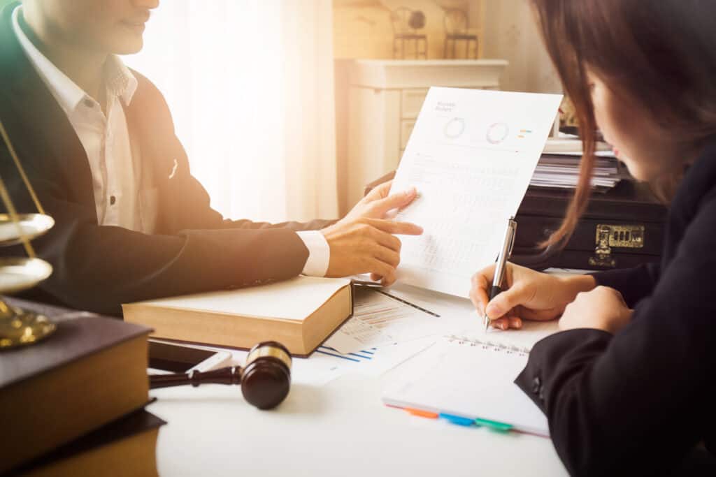 Guy presenting documents and reports