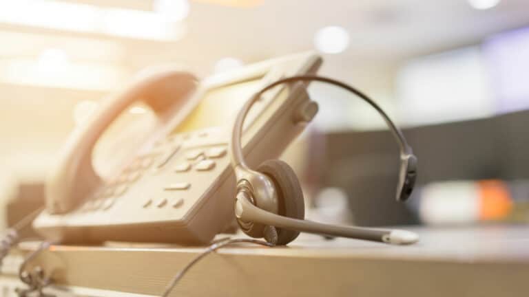 A photo of phone with headset