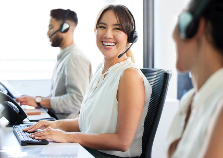 Cxperts Business Process Outsourcing (BPO) professionals working in a modern office environment, collaborating on customer experience solutions