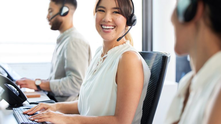 Cxperts Business Process Outsourcing (BPO) professionals working in a modern office environment, collaborating on customer experience solutions