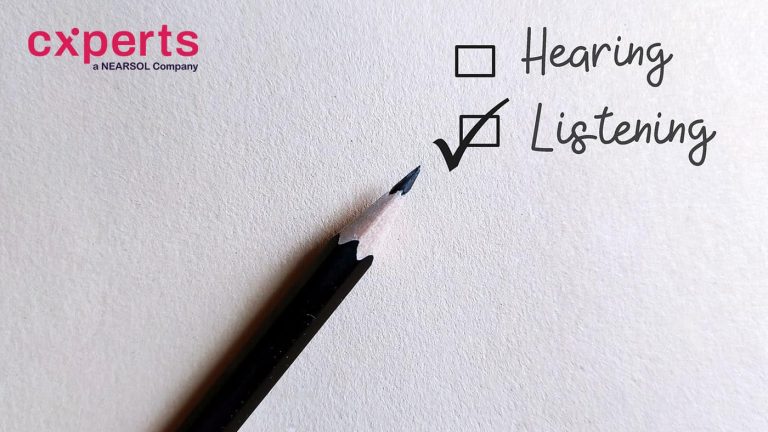 Pencil on white paper with check box HEARING and LISTENING, concept of choose to listen than just hear, pauy more attention and understand meaning behind the words