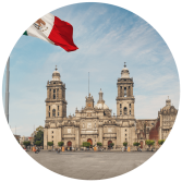 a large building with a flag in the background