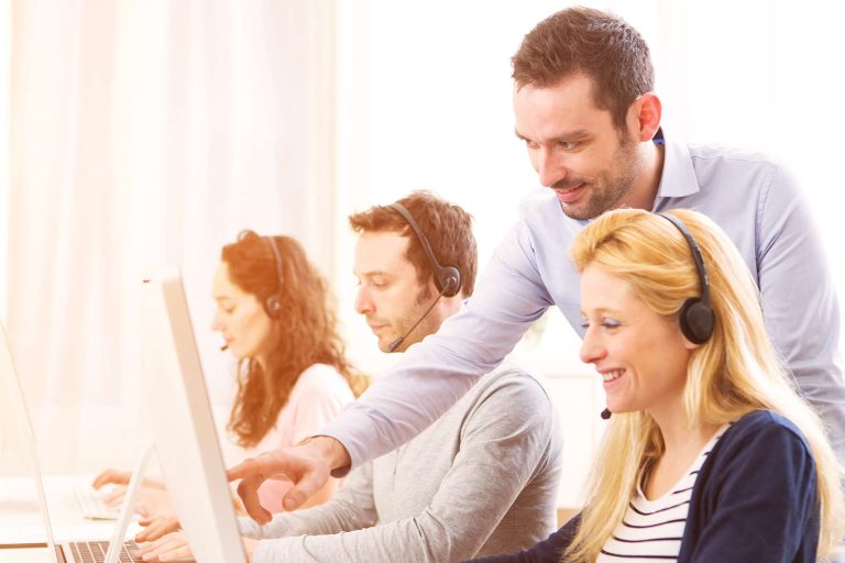 Call Center Agents happily working together