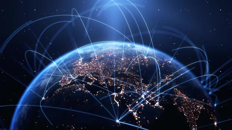 Earth view from space with illuminated cities and glowing blue global network connections