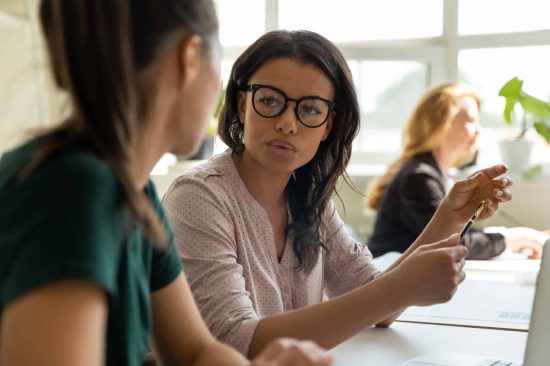 careers-photos-04.jpg photo of woman talking to her colleague