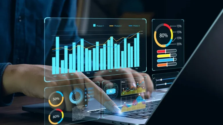 A person uses a laptop displaying virtual data visualizations, including bar and pie charts. The scene conveys advanced analytics and technology.
